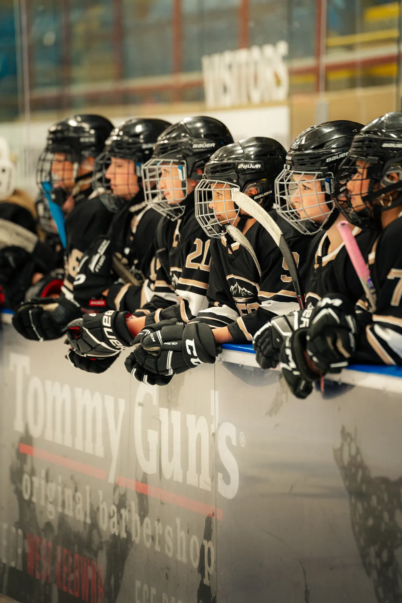 Okanagan Female Selects players lined up along the boards